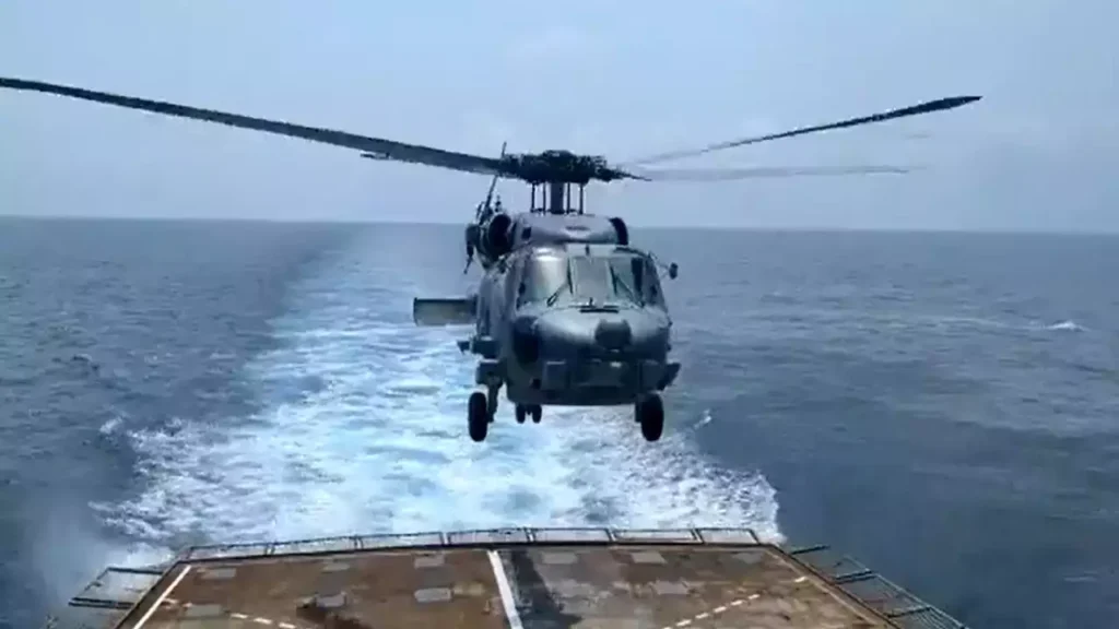 Indian Navy MH-60R ASW helicopter undertakes maiden landing on Destroyer INS Kolkata